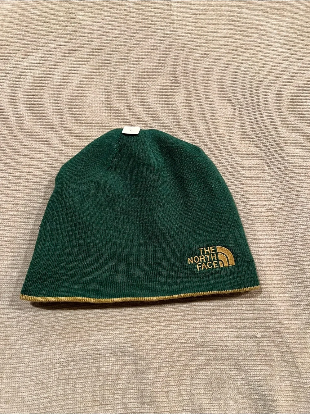 The North Face Mustard Yellow Beanie with Dark Green Lettering